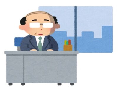 窓際FIREの前提になる、窓際に座る暇そうなスーツの男性
